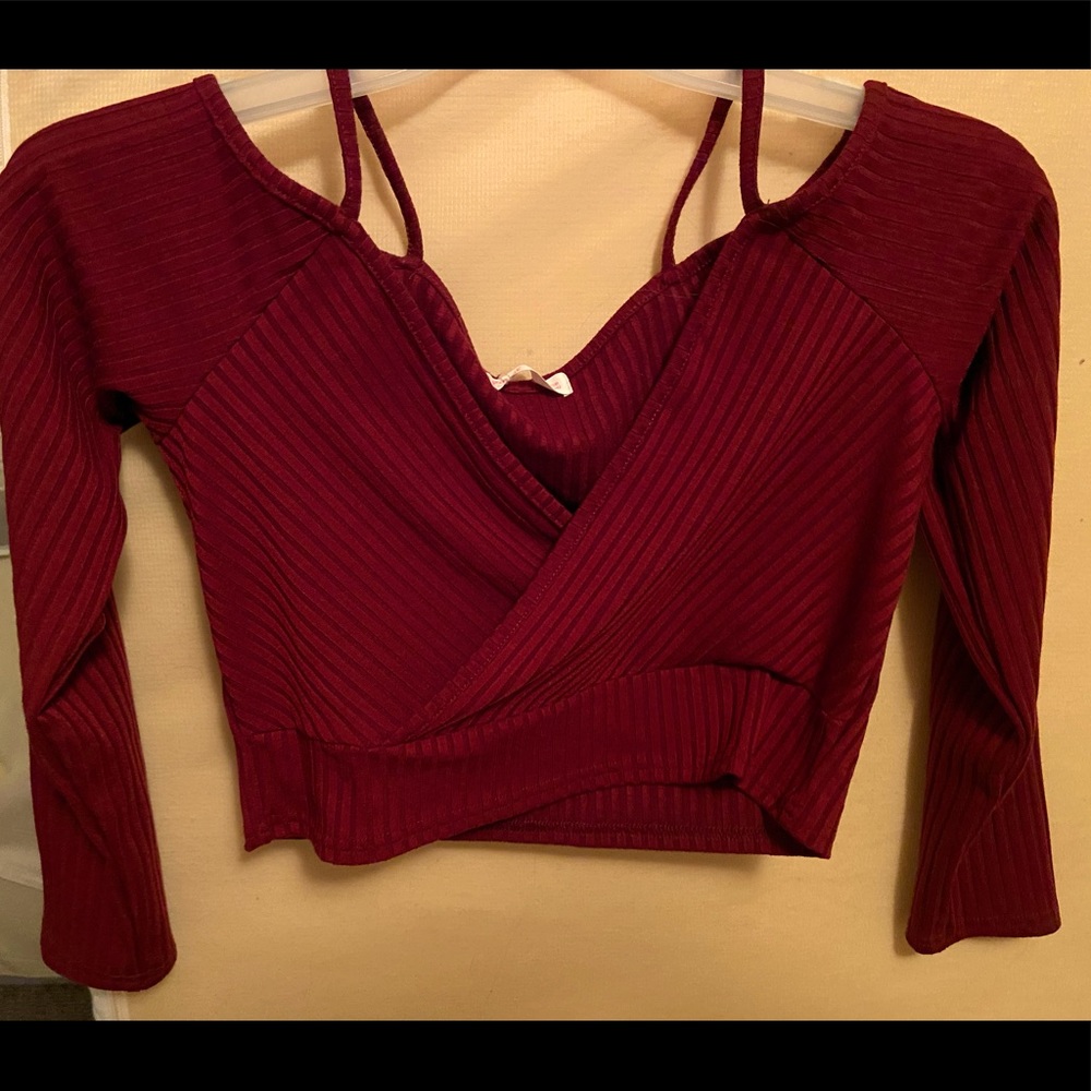 Burgundy cropped tee. Says large 10/12 but has problems fitting bigger chest.